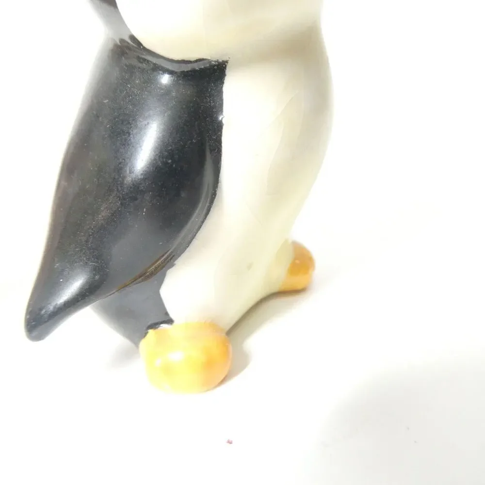 2 Norcrest Japan Salt Pepper Shakers Pink Skunk Squirrel + Penguin Vintage MCM